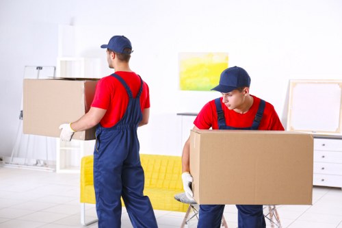 Flat removals team handling access and loading in St Johns Wood