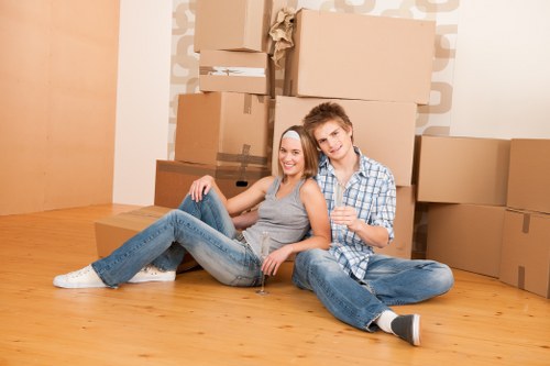 Professional movers securing items safely for transport