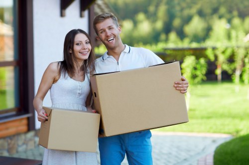 Packed boxes and furniture ready for transport in a local removal van