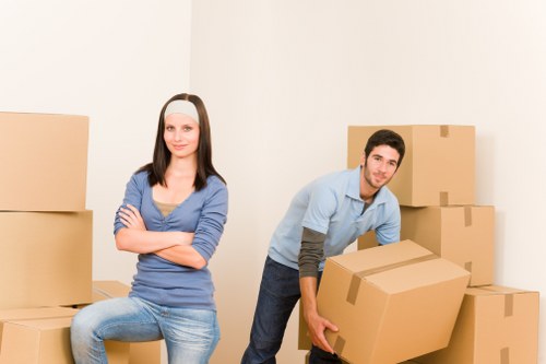 Student removals team planning a move in St Johns Wood with residential street access