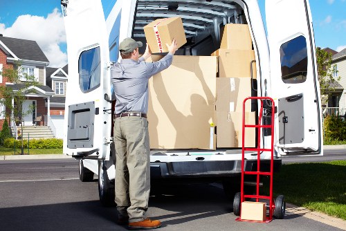 Careful handling of boxes and small furniture during a student removal in St Johns Wood