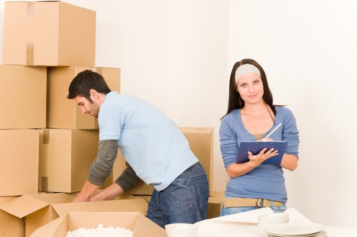 Careful packing of office furniture and equipment for a local business relocation