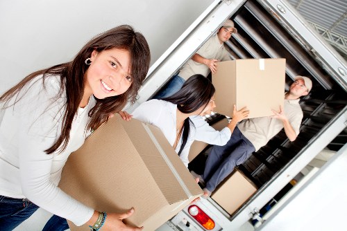 Professional moving van service handling household items in St Johns Wood