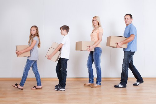 Movers navigating access and loading for an apartment move in St Johns Wood